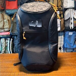 UAG Standard issue with metal astronaut patch and gold paracord work